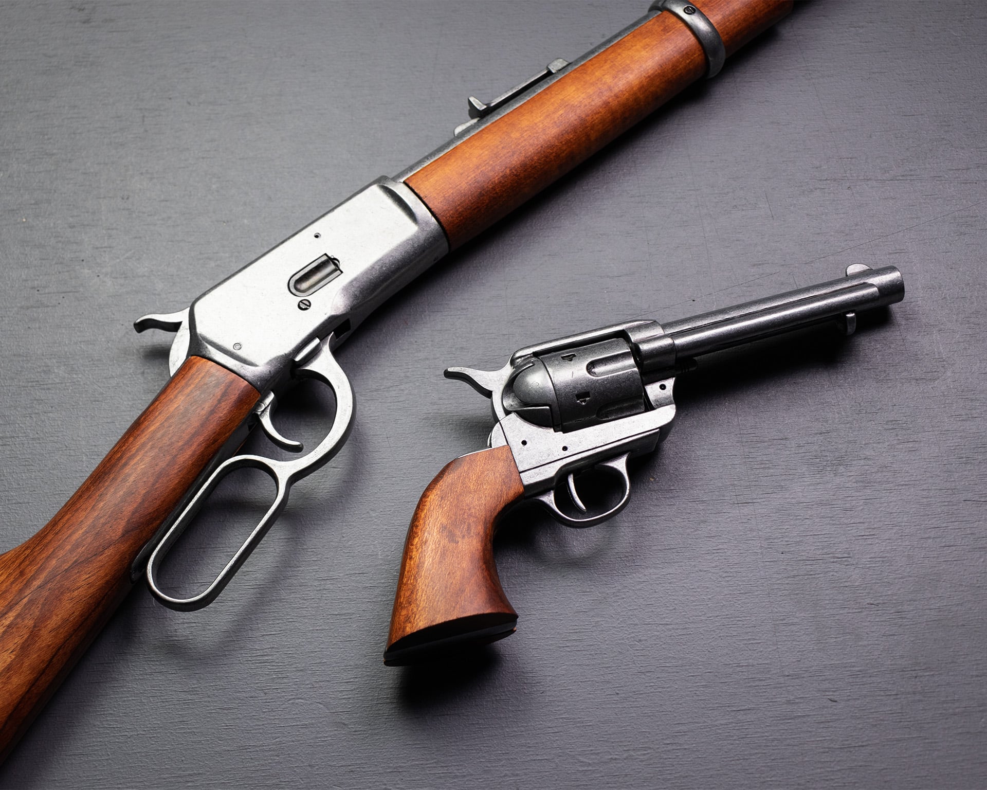 Denix replica firearms including Beretta 92 and Colt Peacemaker